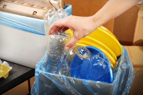Workers sorting construction debris for recycling